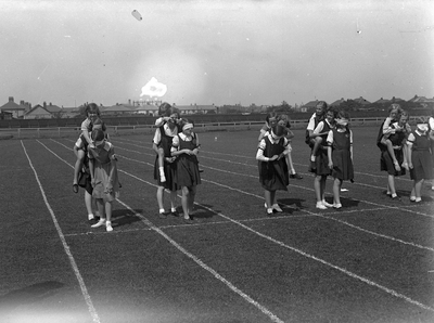 Girls charcoal race at Morecambe Grammar School sports day
