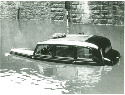Flooded taxi underneath Church Railway Bridge