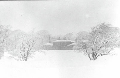Clayton Hall under snow, view from across parkland