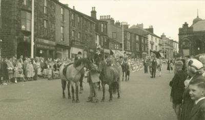 Colne Carnival procession, Church Street, 1960