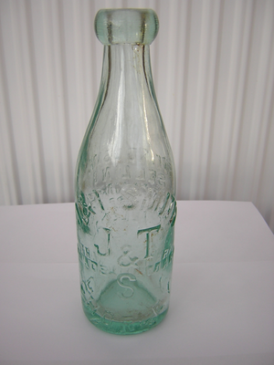 Glass bottle from J & T Smith, Chorley