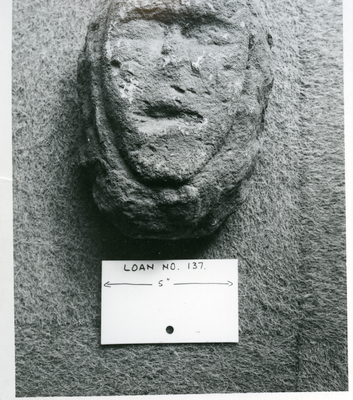 Stone carved head found in garden of Foresters Buildings.