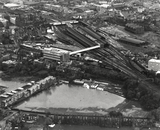 Aerial view of the railway station and a flooded Preston Cricket Ground, Preston