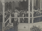 Visit of George V and Queen Mary: acknowledging the cheers on the Town Hall steps, Market Place, Preston