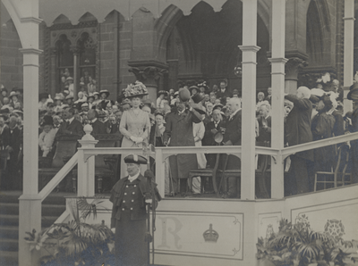 Visit of George V and Queen Mary: acknowledging the cheers on the Town Hall steps, Market Place, Preston