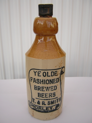 Stone beer bottle from T & R Smith, Chorley