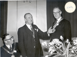 Investiture of Roy Redman as first president of Leyland  Rotary Club at the Charter Dinner in 1954