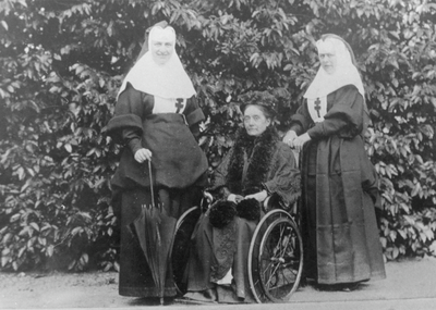 Nuns and elderly lady in the grounds of Clayton Hall