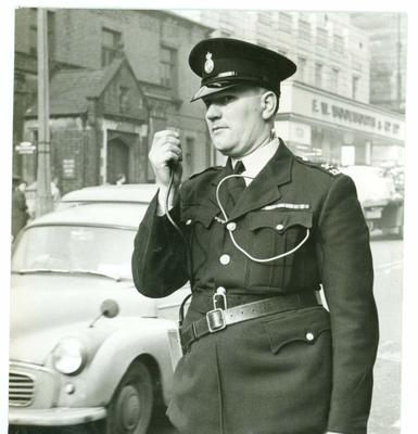 Policeman with personal radio