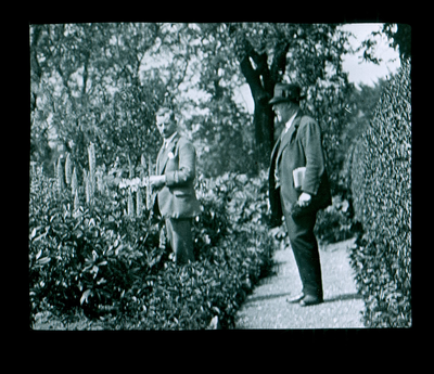 Colne - Joe and H Hewitt-Dean in a garden